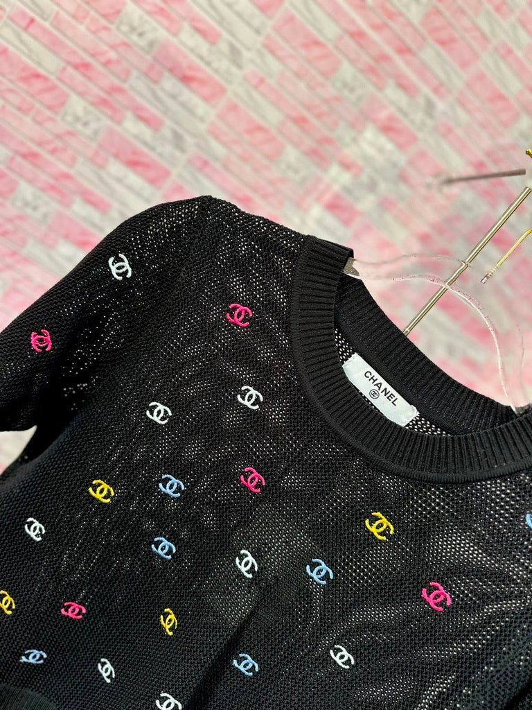 Blusa Channel negra multi
